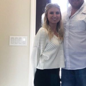 Sweater with tie up back bow